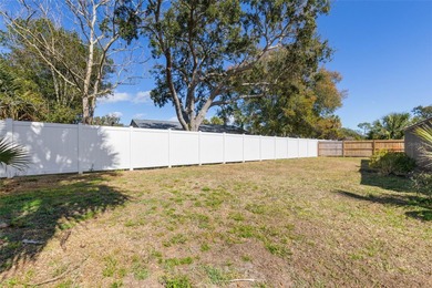 Do you like to play Golf? Are you looking for a place in a quiet on Palm Harbor Golf Club in Florida - for sale on GolfHomes.com, golf home, golf lot