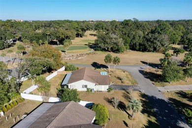 Do you like to play Golf? Are you looking for a place in a quiet on Palm Harbor Golf Club in Florida - for sale on GolfHomes.com, golf home, golf lot