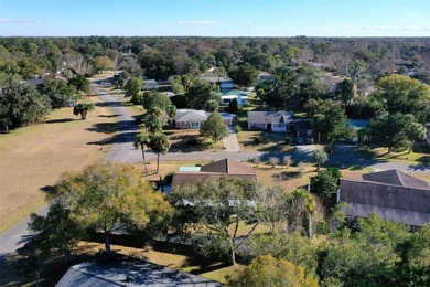 Do you like to play Golf? Are you looking for a place in a quiet on Palm Harbor Golf Club in Florida - for sale on GolfHomes.com, golf home, golf lot