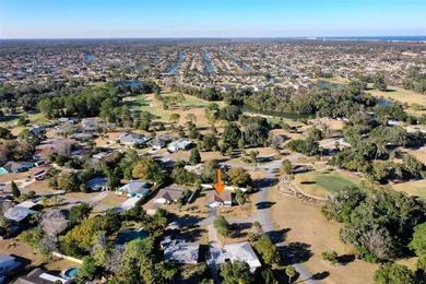 Do you like to play Golf? Are you looking for a place in a quiet on Palm Harbor Golf Club in Florida - for sale on GolfHomes.com, golf home, golf lot