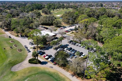 Do you like to play Golf? Are you looking for a place in a quiet on Palm Harbor Golf Club in Florida - for sale on GolfHomes.com, golf home, golf lot
