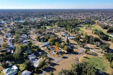 Do you like to play Golf? Are you looking for a place in a quiet on Palm Harbor Golf Club in Florida - for sale on GolfHomes.com, golf home, golf lot