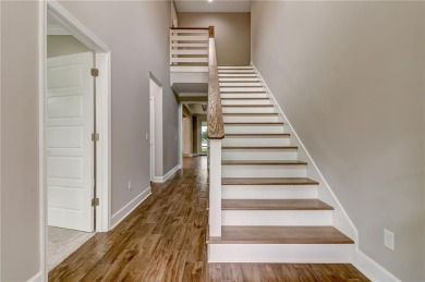 This stunning two-story home by renowned local builder Josselyn on Laurel Island Links in Georgia - for sale on GolfHomes.com, golf home, golf lot
