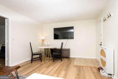 Discover top floor living in one of Buckhead's best kept secrets on Cross Creek Golf Course in Georgia - for sale on GolfHomes.com, golf home, golf lot