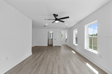 Welcome to your dream home in the most desirable gated community on Southern Hills Plantation Club in Florida - for sale on GolfHomes.com, golf home, golf lot