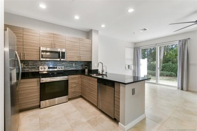 Beautifully maintained END-UNIT townhouse in a GATED community on Heritage Ridge Golf Club in Florida - for sale on GolfHomes.com, golf home, golf lot