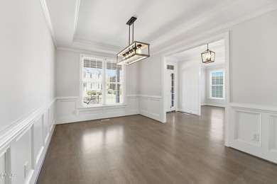 Welcome to this resort-style, beautiful home in the highly on TPC at Wakefield Plantation in North Carolina - for sale on GolfHomes.com, golf home, golf lot