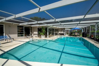 Desirable Pool Home in Seminole Lake Golf & Country Club Estates on Seminole Lake Country Club in Florida - for sale on GolfHomes.com, golf home, golf lot