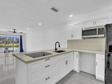 Rarely available 2/2 first-floor unit with stunning water views! on  in Florida - for sale on GolfHomes.com, golf home, golf lot