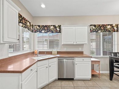 Welcome to your new home in a truly gated community! This on Eagle Ridge At Spruce Creek Country Club in Florida - for sale on GolfHomes.com, golf home, golf lot