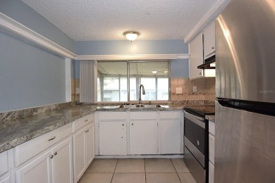 One or more photo(s) has been virtually staged. **SELLER on Beacon Woods Golf Club in Florida - for sale on GolfHomes.com, golf home, golf lot