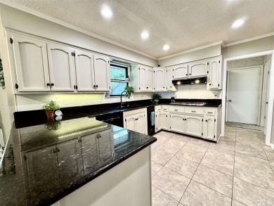 Welcome to 9754 Quail Hollow, situated on the 15th fairway of on Scenic Hills Country Club in Florida - for sale on GolfHomes.com, golf home, golf lot