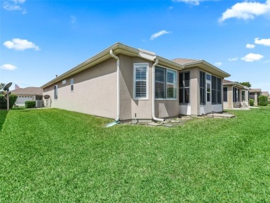 Welcome to your new home in a truly gated community! This on Eagle Ridge At Spruce Creek Country Club in Florida - for sale on GolfHomes.com, golf home, golf lot