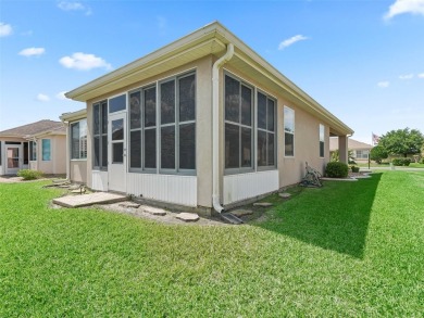 Welcome to your new home in a truly gated community! This on Eagle Ridge At Spruce Creek Country Club in Florida - for sale on GolfHomes.com, golf home, golf lot