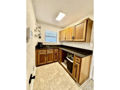 Welcome to 9754 Quail Hollow, situated on the 15th fairway of on Scenic Hills Country Club in Florida - for sale on GolfHomes.com, golf home, golf lot