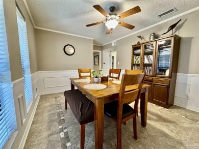 Welcome to 9754 Quail Hollow, situated on the 15th fairway of on Scenic Hills Country Club in Florida - for sale on GolfHomes.com, golf home, golf lot