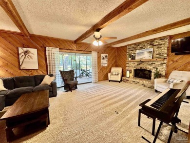 Welcome to 9754 Quail Hollow, situated on the 15th fairway of on Scenic Hills Country Club in Florida - for sale on GolfHomes.com, golf home, golf lot