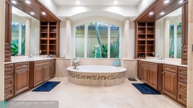 Major price improvement! Experience luxury Parkland living in on Heron Bay Golf Club in Florida - for sale on GolfHomes.com, golf home, golf lot