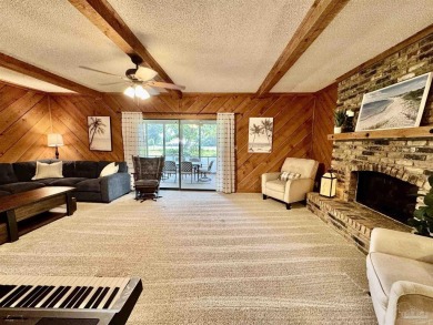 Welcome to 9754 Quail Hollow, situated on the 15th fairway of on Scenic Hills Country Club in Florida - for sale on GolfHomes.com, golf home, golf lot