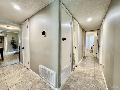 Welcome to 9754 Quail Hollow, situated on the 15th fairway of on Scenic Hills Country Club in Florida - for sale on GolfHomes.com, golf home, golf lot