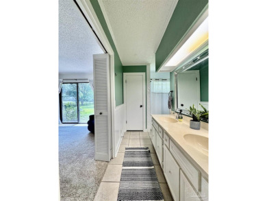 Welcome to 9754 Quail Hollow, situated on the 15th fairway of on Scenic Hills Country Club in Florida - for sale on GolfHomes.com, golf home, golf lot
