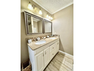 Welcome to 9754 Quail Hollow, situated on the 15th fairway of on Scenic Hills Country Club in Florida - for sale on GolfHomes.com, golf home, golf lot