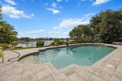 Sitting on a prime golf lake front lot, this custom estate on Quail West Golf and Country Club in Florida - for sale on GolfHomes.com, golf home, golf lot