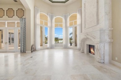 Sitting on a prime golf lake front lot, this custom estate on Quail West Golf and Country Club in Florida - for sale on GolfHomes.com, golf home, golf lot