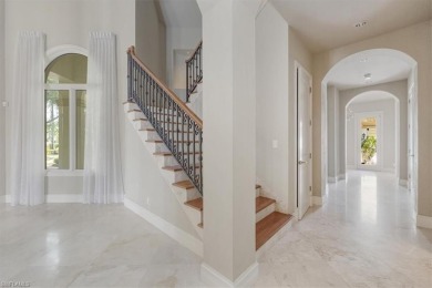 Sitting on a prime golf lake front lot, this custom estate on Quail West Golf and Country Club in Florida - for sale on GolfHomes.com, golf home, golf lot