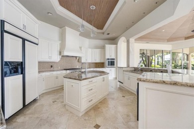 Sitting on a prime golf lake front lot, this custom estate on Quail West Golf and Country Club in Florida - for sale on GolfHomes.com, golf home, golf lot