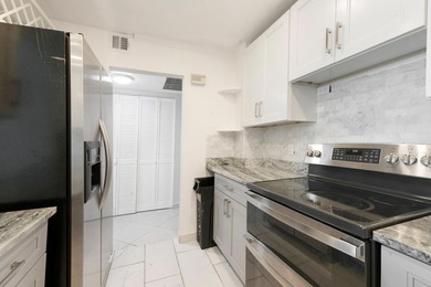 Beautifully updated 2-bedroom, 2-bathroom condo featuring an on The Club at Emerald Hills in Florida - for sale on GolfHomes.com, golf home, golf lot