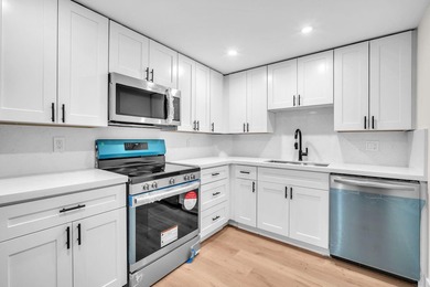 Beautiful fully renovated 2-bedroom, 2-bath penthouse featuring on The Club at Emerald Hills in Florida - for sale on GolfHomes.com, golf home, golf lot