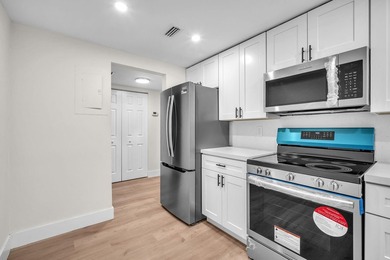 Beautiful fully renovated 2-bedroom, 2-bath penthouse featuring on The Club at Emerald Hills in Florida - for sale on GolfHomes.com, golf home, golf lot