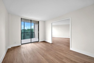 Beautiful fully renovated 2-bedroom, 2-bath penthouse featuring on The Club at Emerald Hills in Florida - for sale on GolfHomes.com, golf home, golf lot