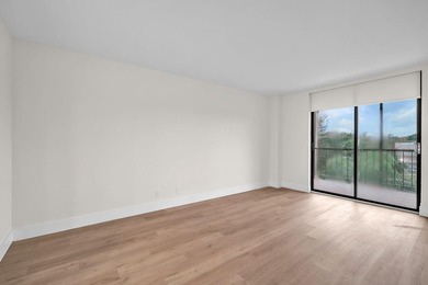 Beautiful fully renovated 2-bedroom, 2-bath penthouse featuring on The Club at Emerald Hills in Florida - for sale on GolfHomes.com, golf home, golf lot