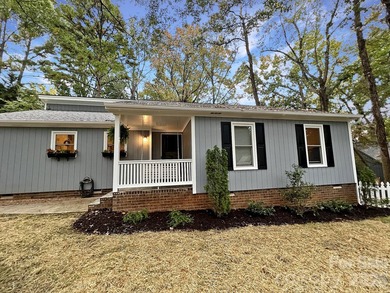 This original Tega Cay contemporary is move in ready and a on Tega Cay Golf Club in South Carolina - for sale on GolfHomes.com, golf home, golf lot