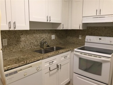 Located in the heart of Emerald Hills, this charming first-floor on The Club at Emerald Hills in Florida - for sale on GolfHomes.com, golf home, golf lot