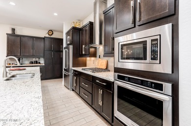 Set within an exclusive gated enclave directly across from the on Troon Country Club in Arizona - for sale on GolfHomes.com, golf home, golf lot