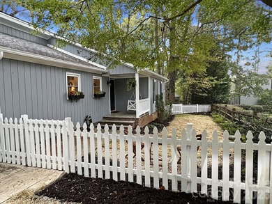 This original Tega Cay contemporary is move in ready and a on Tega Cay Golf Club in South Carolina - for sale on GolfHomes.com, golf home, golf lot