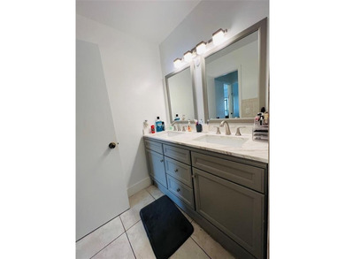 Located in the heart of Emerald Hills, this charming first-floor on The Club at Emerald Hills in Florida - for sale on GolfHomes.com, golf home, golf lot