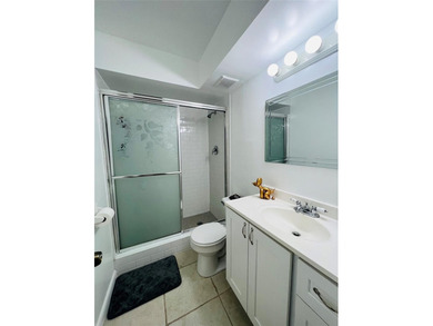 Located in the heart of Emerald Hills, this charming first-floor on The Club at Emerald Hills in Florida - for sale on GolfHomes.com, golf home, golf lot