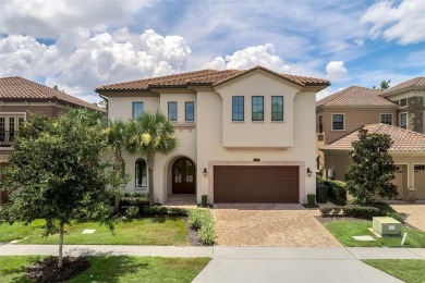 Completely refreshed contemporary style home with Spanish tile on Reunion Resort Golf Course in Florida - for sale on GolfHomes.com, golf home, golf lot