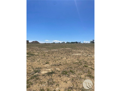 -Empty lot in Lake Hills Subdivision by Lake Hills Golf Course on Lake Hills Golf Course in Montana - for sale on GolfHomes.com, golf home, golf lot