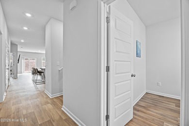 Elegantly appointed resale townhome located in The Hamptons at on Brunswick Plantation and Golf Resorts in North Carolina - for sale on GolfHomes.com, golf home, golf lot