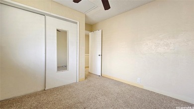 Charming 2-bedroom, 1.5-bath perimeter townhome that sits along on Pearl Country Club in Hawaii - for sale on GolfHomes.com, golf home, golf lot