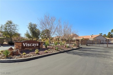 This stunning home boasts soaring vaulted ceilings, creating an on Painted Desert Golf Club in Nevada - for sale on GolfHomes.com, golf home, golf lot