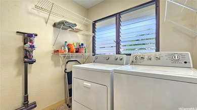 Charming 2-bedroom, 1.5-bath perimeter townhome that sits along on Pearl Country Club in Hawaii - for sale on GolfHomes.com, golf home, golf lot