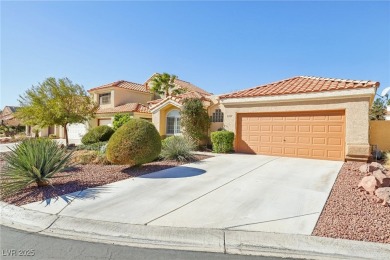 This stunning home boasts soaring vaulted ceilings, creating an on Painted Desert Golf Club in Nevada - for sale on GolfHomes.com, golf home, golf lot