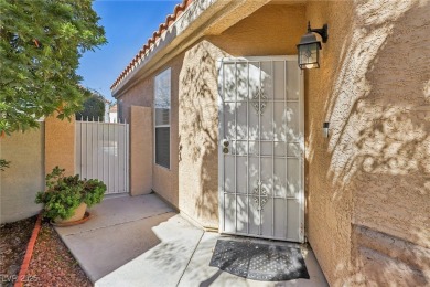 This stunning home boasts soaring vaulted ceilings, creating an on Painted Desert Golf Club in Nevada - for sale on GolfHomes.com, golf home, golf lot