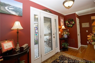 Perfectly positioned on a dog-leg right par five of the Seven on Seven Lakes Country Club in North Carolina - for sale on GolfHomes.com, golf home, golf lot